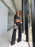 Conjunto deportivo tela rib con detalles de rayas contrastantes